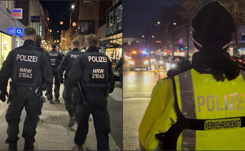 Polizisten in Solingen bei Nacht, Einsatz im urbanen Raum mit Sicht auf den Verkehr.